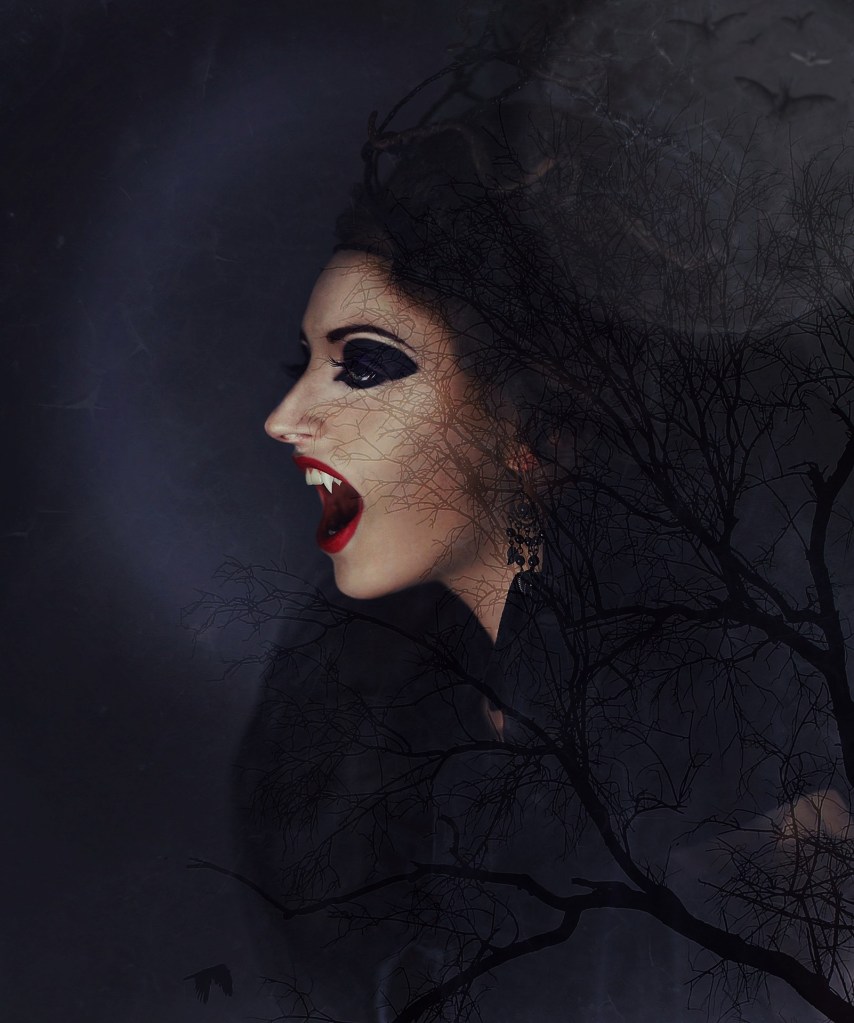 Vampire woman bearing her fangs