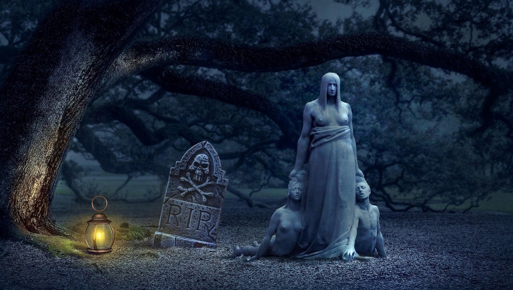 A fantasy graveyard at night with a stone statue of a woman holding the heads of two stone bodies on the ground.